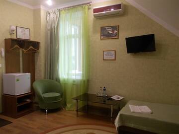 Фото номера Однокомнатный трехместный Гостиница Шакира г. Ижевск 3