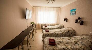 Фото номера Трехместный номер с общей ванной комнатой Гостевой дом Perina Inn г. Ижевск 5