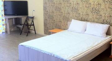 Фото номера Апартаменты с видом на сад Апартаменты Guest House MART г. Ижевск 3